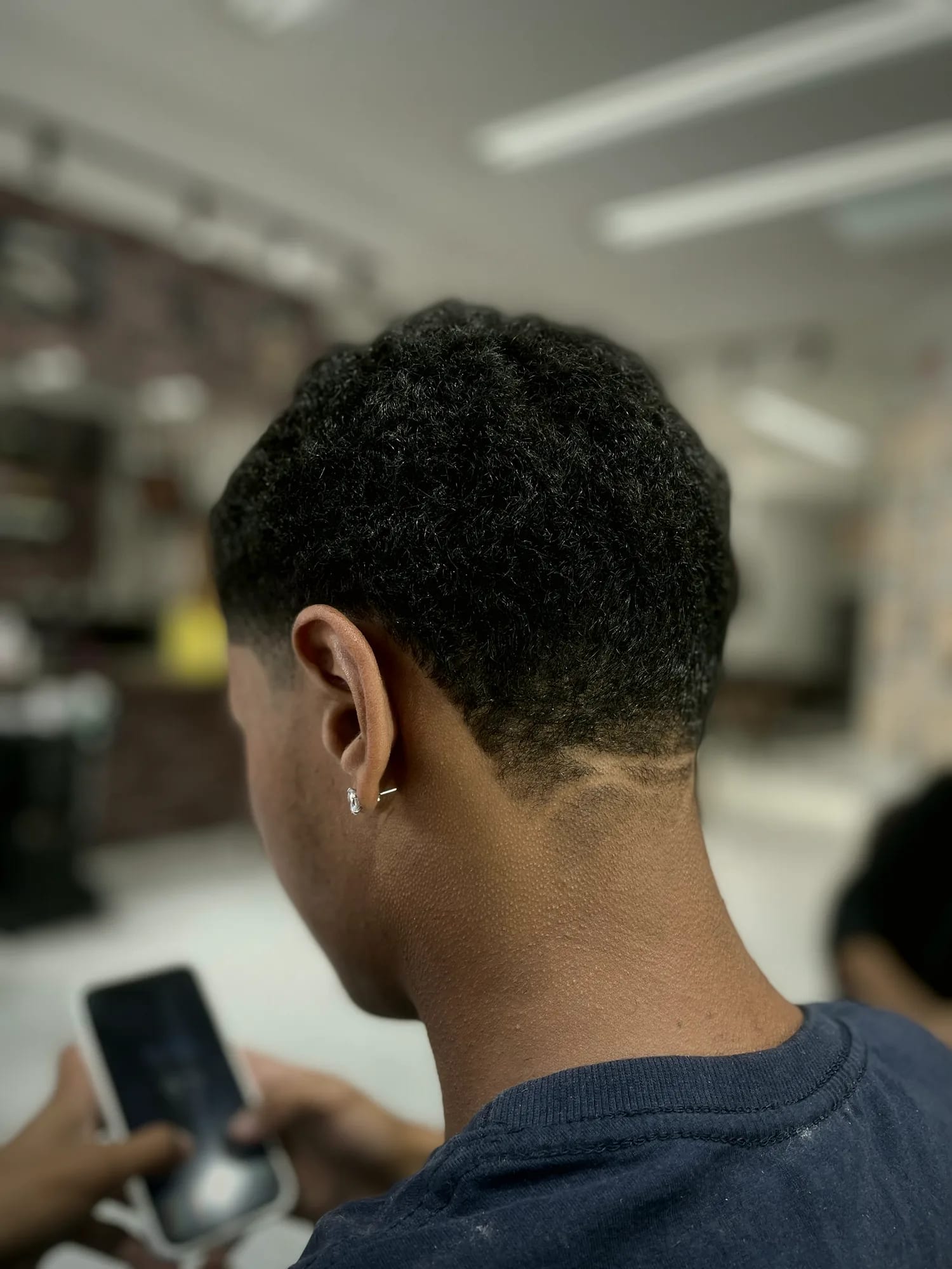 Taper em cabelo afro